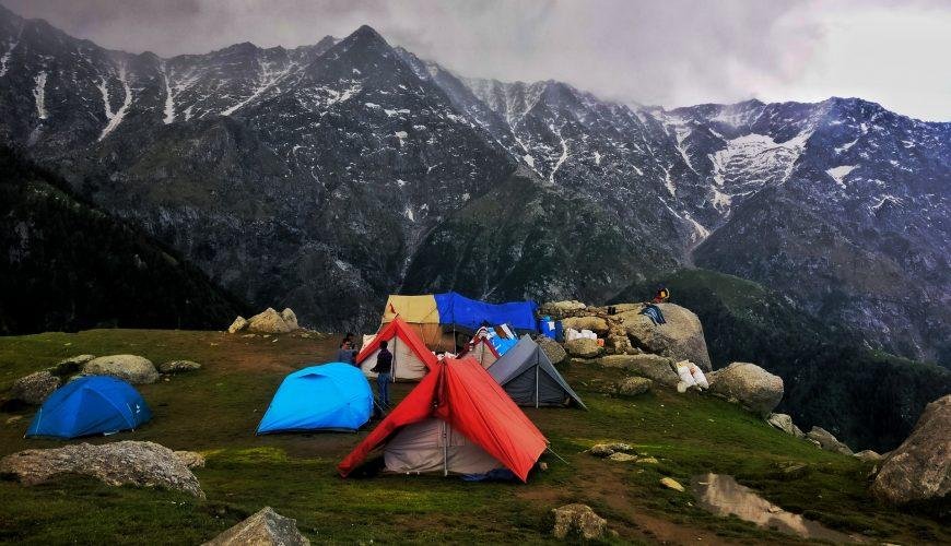 Tents on platue and mountains in background